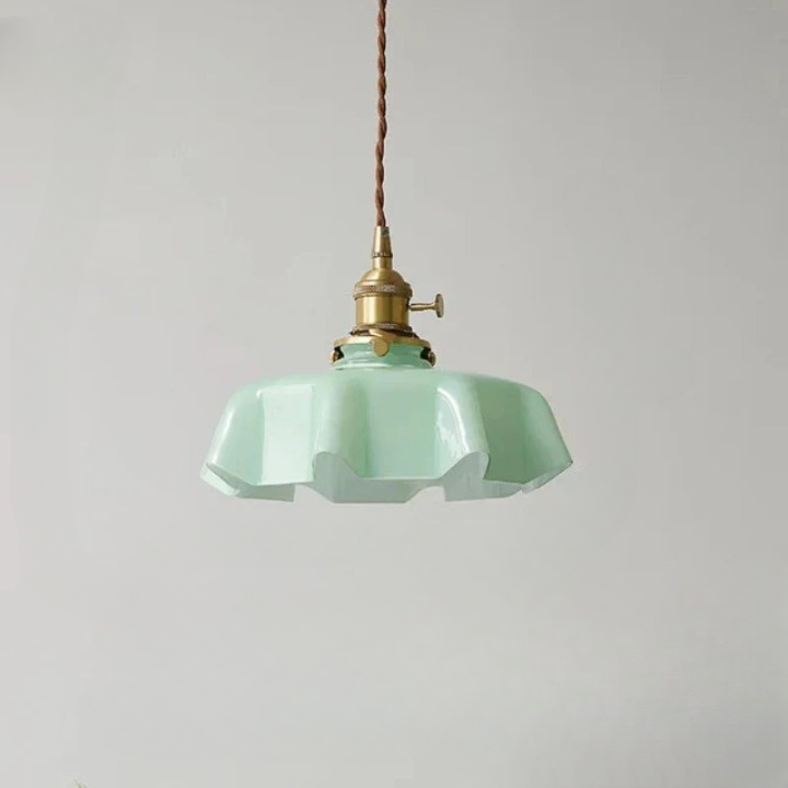 Chic brass pendant light, a French vintage hanging lamp adding warm elegance to any home.