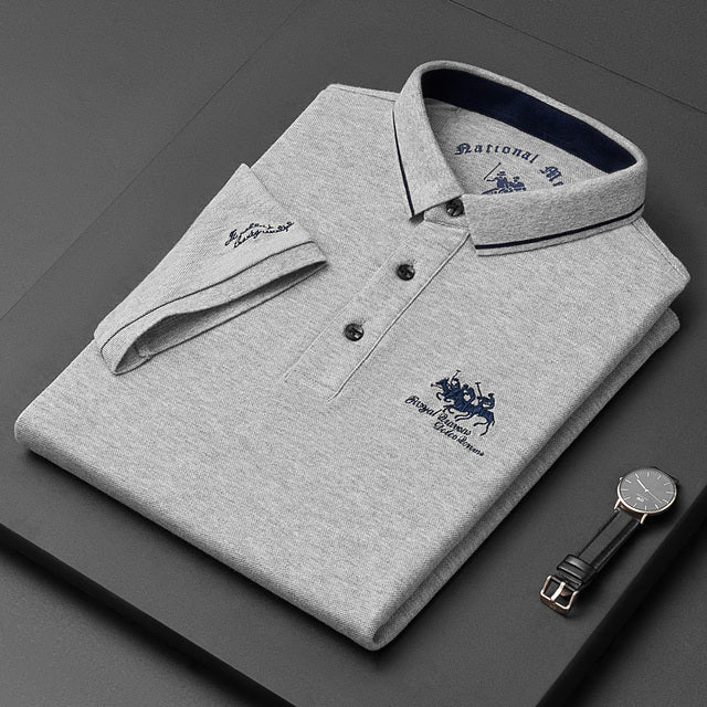 Men's short sleeve classic polo in a premium cotton blend, offering comfort and style for versatile everyday wear.