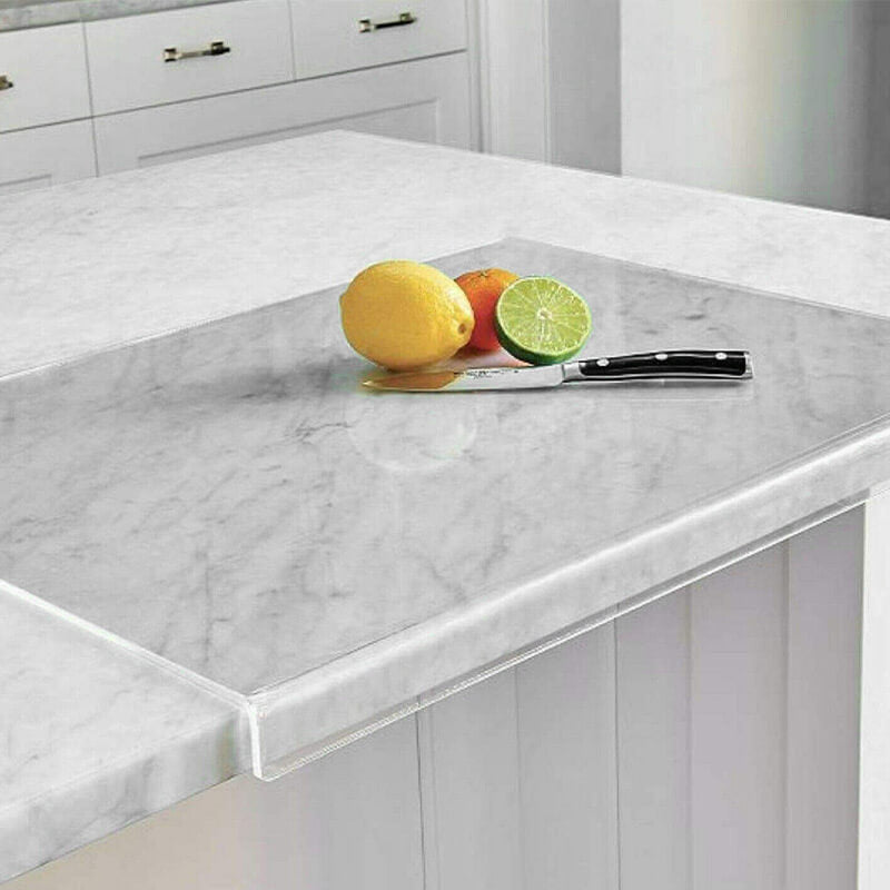 Clear acrylic non-slip cutting board for safe food prep; modern kitchen tool for hygiene.