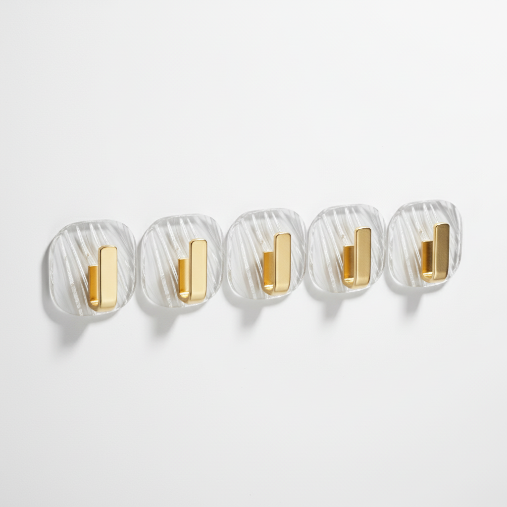 Multiple clear acrylic hooks on a white background, ready for easy no-drill installation for home organization
