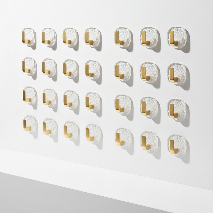 Packaging display of clear acrylic wall hooks, emphasizing the damage-free and no-drill features for easy setup