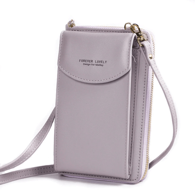 Women's small PU leather shoulder bag, versatile and compact, with adjustable crossbody strap.