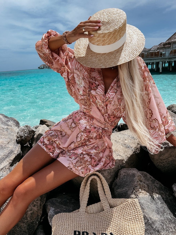 Back view: Comfortable women's lilac two-piece summer outfit, ideal for breezy vacation wear.