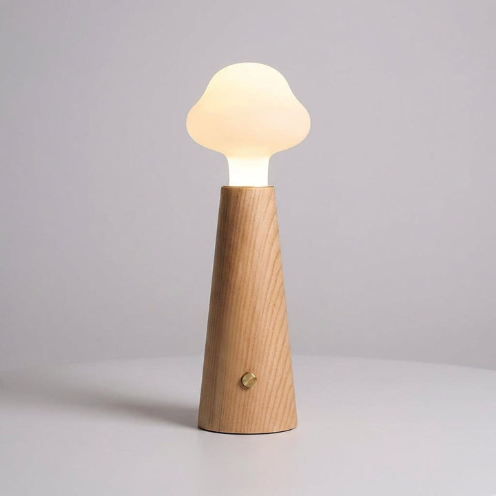Cloud LED table lamp with a minimalist design, Nebulite, perfect as a bedside reading light.