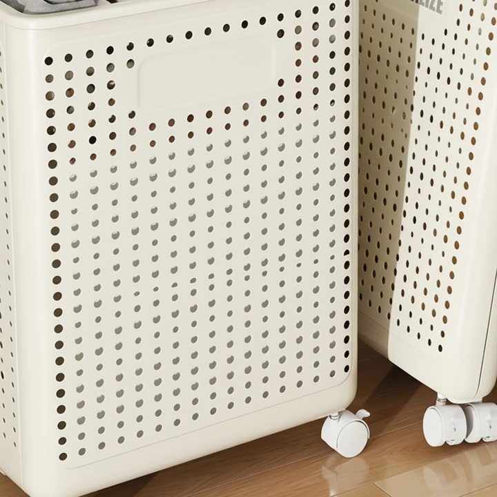 LaundryGlide collapsible basket on wheels, shown in a clean bathroom, holding towels, for storage.