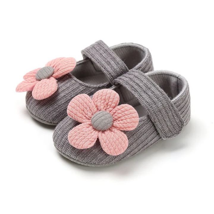 Playful baby shoes, gender-neutral design, offering ultimate comfort & support for tiny feet's first steps.