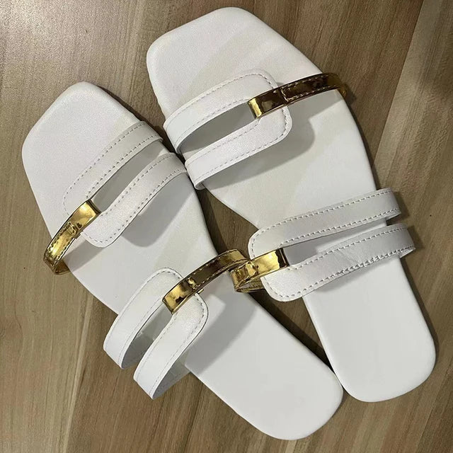 Chic casual flat slides, women's open toe beach footwear & stylish vacation slippers.