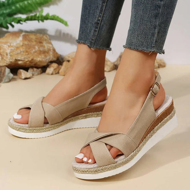 Trendy Romy women's wedge sandals with a comfortable platform design, perfect for summer fashion.