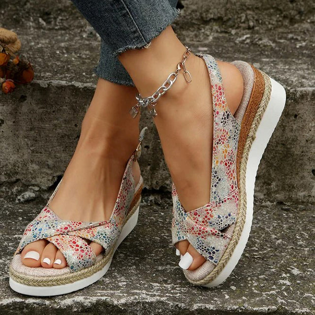 Fashionable Romy women's wedge sandals featuring a comfortable platform, great for summer walking.