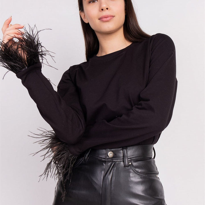Comfortable women's long sleeve basic tee with a round neck for everyday casual wear. Slim fit design.