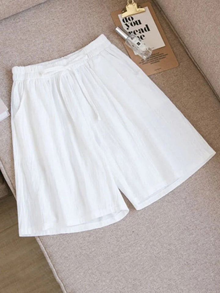 Comfortable women's stretch waist shorts, perfect for summer leisure wear & everyday comfort. Breathable & lightweight.