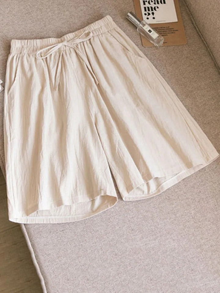 Melina women's casual stretch shorts with an elastic waist, ideal for comfortable summer fashion & leisure.