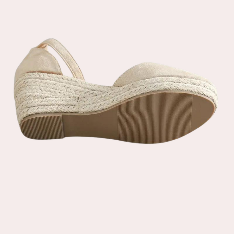 Stylish women's wedge heels featuring a secure adjustable ankle strap, suitable for events & everyday comfort.