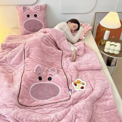Cozy cartoon plush blanket and cushion set. Soft fleece for home comfort.