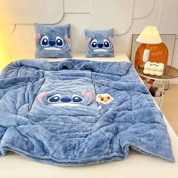 Travel-friendly cartoon plush blanket and cushion. Soft fleece comfort.