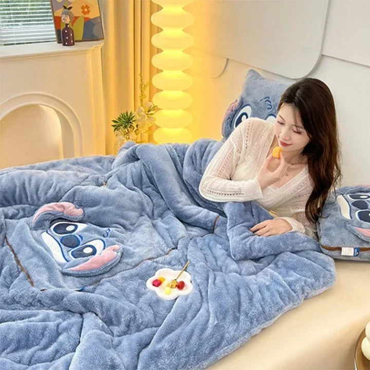 Cozy cartoon plush blanket and matching cushion. Perfect for kids' bedroom decor.