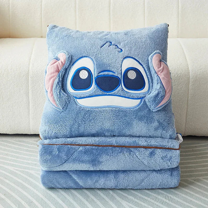 Home comfort gift: Soft fleece character blanket and plush cartoon cushion.