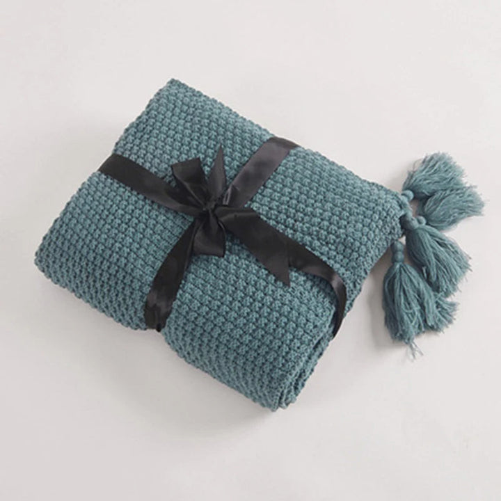 Soft & warm knitted wool throw, perfect for snuggling on the sofa or as a bed blanket.