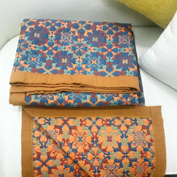 High-quality six-layer cotton quilt with a striking orange and blue pattern for bedding