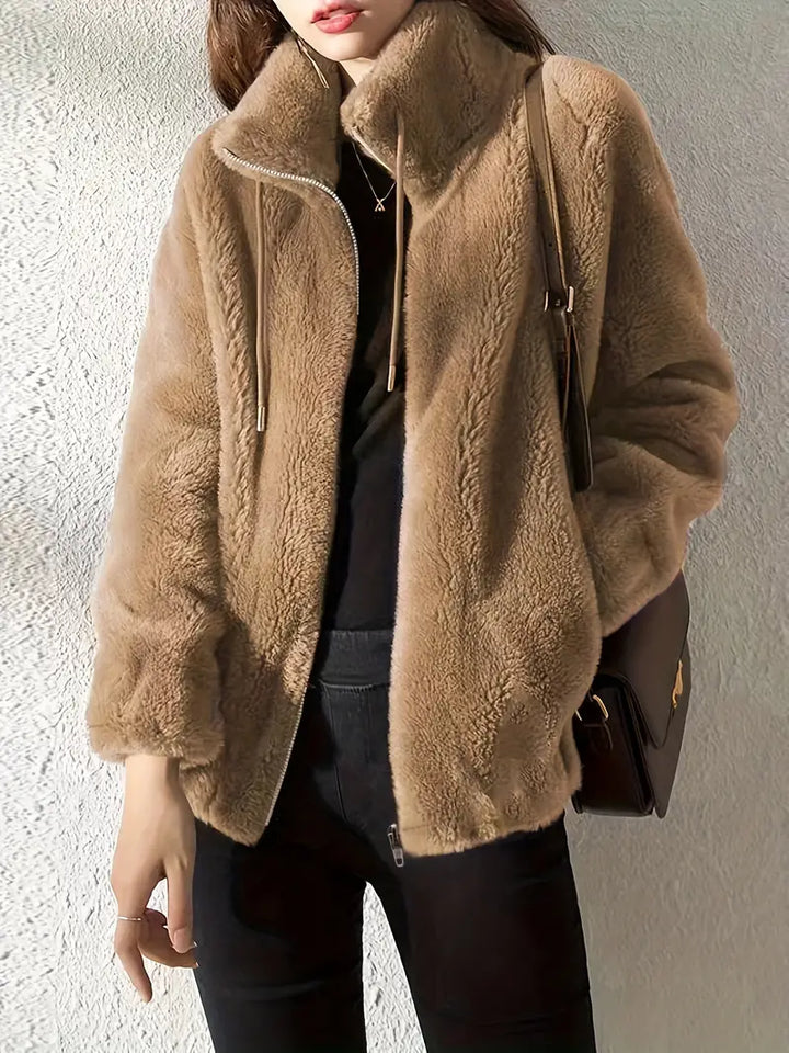 Women's soft teddy hooded zip-up jacket, cozy and warm with an adjustable drawstring for winter.