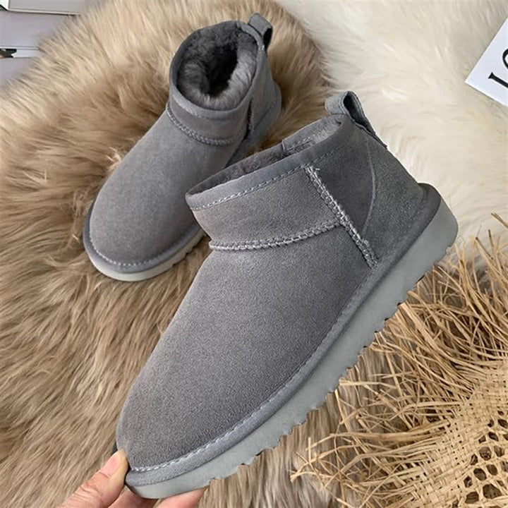 Weatherproof women's low-cut ankle winter boots, warmly lined for ultimate comfort and protection.