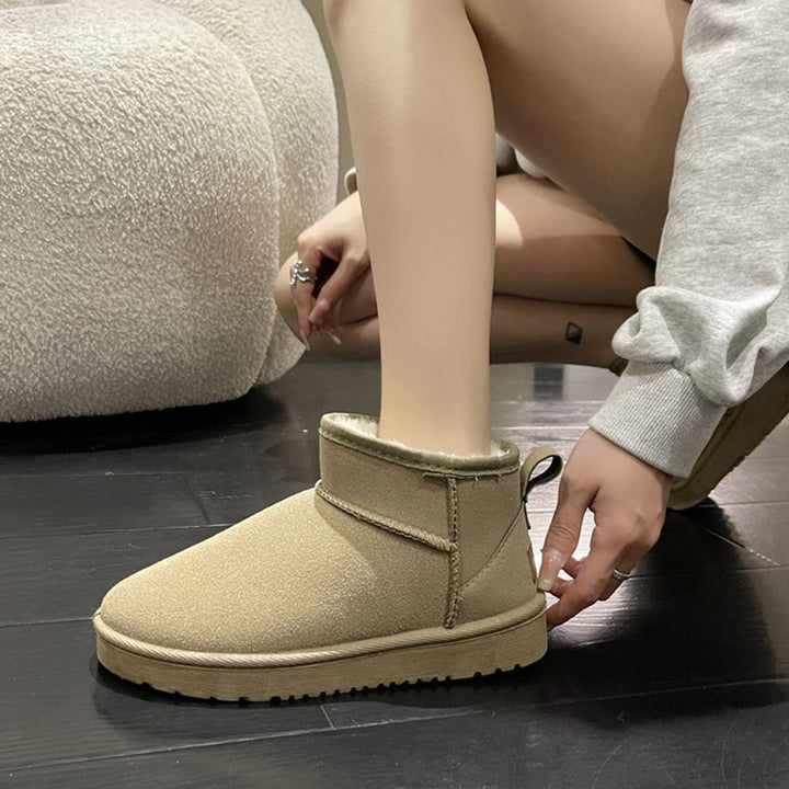 Comfortable and durable women's lined ankle winter boots, perfect for staying warm and stylish.
