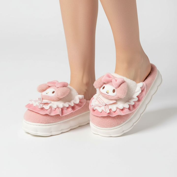 Soft women's CozyFluff winter slippers, fleece-lined and featuring a delightful playful motif for warmth.