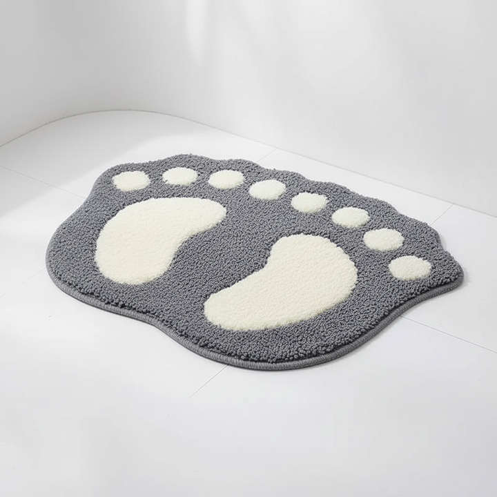 Absorbent and non-slip foot-shaped bath mat, CozyFoot, enhancing bathroom decor with memory foam
