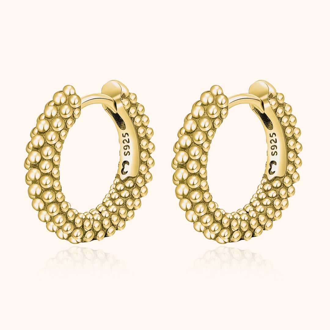 Minimalist women's dainty pearl hoop earrings, sterling silver with gold plating. Perfect for elegant everyday wear.