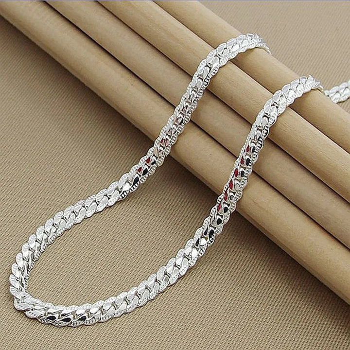 Dainty women's sparkling sterling silver chain necklace. Elegant jewelry gift.