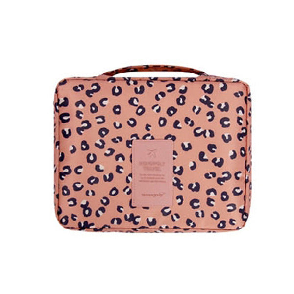 Elegant dark blue floral waterproof makeup organizer, perfect for travel.