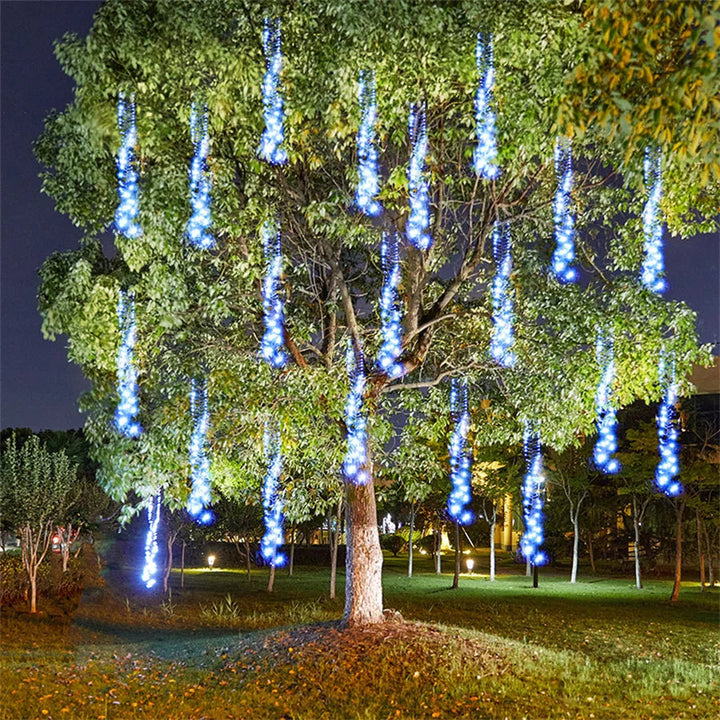 Dazzling LED meteor shower lights illuminating a garden path, perfect for festive outdoor decor & ambiance.