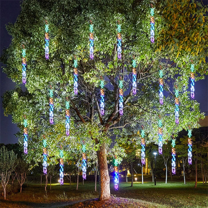 Close-up of waterproof LED meteor shower light tubes, showcasing bright outdoor string lights for patio decor.