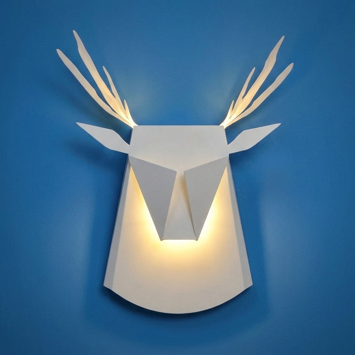Cozy ambient lighting from a decorative deer silhouette wall sconce, a charming rustic home decor lamp.