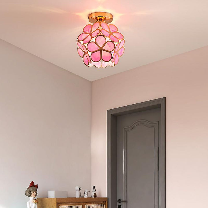 Elegant floral glass ceiling light, providing soft, decorative illumination for bedrooms and living rooms.