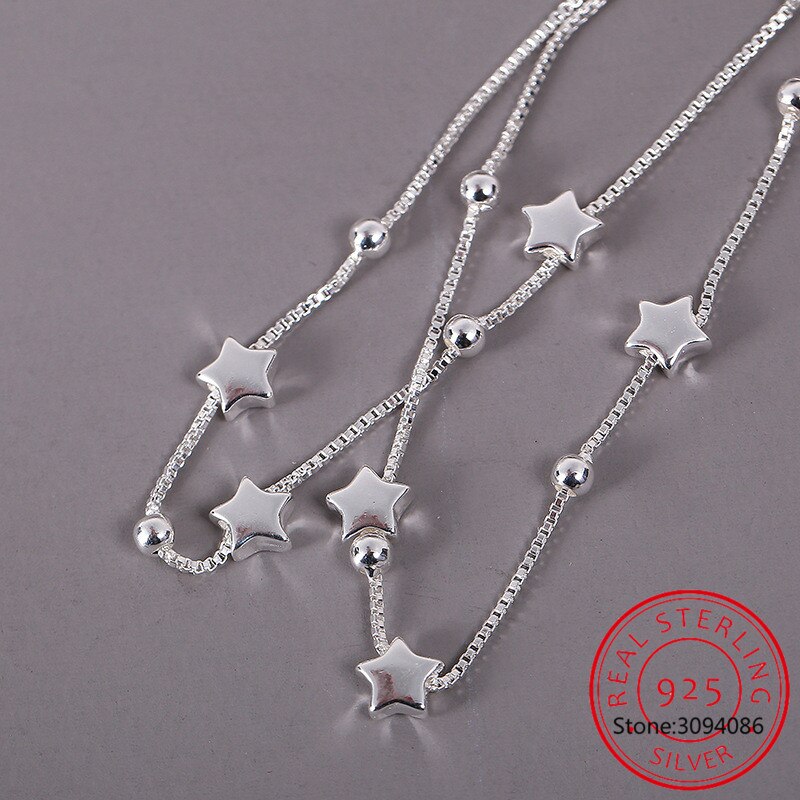 Elegant women's adjustable bracelet with a delicate star charm, perfect for minimalist everyday wear. Sterling silver gift.