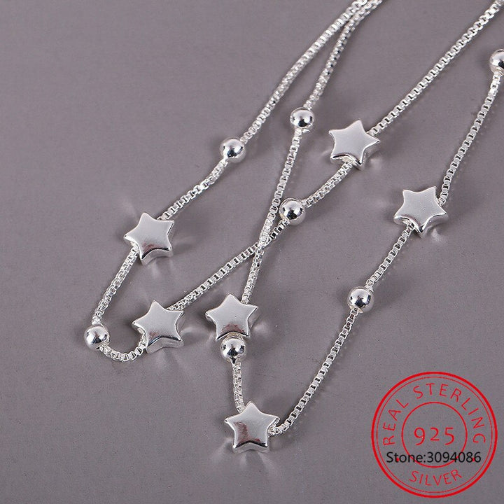 Gift-ready sterling silver adjustable bracelet for women with a delicate star charm. Elegant, minimalist everyday jewelry.