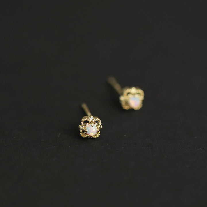 Side view of delicate vintage opal drop earrings for women, exquisite craftsmanship.