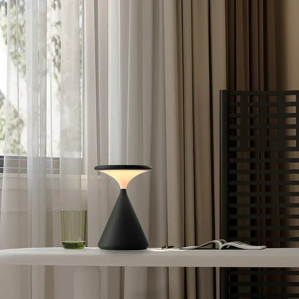 Stylish cordless hourglass lamp, warm dimmable LED, adds ambient light to modern spaces