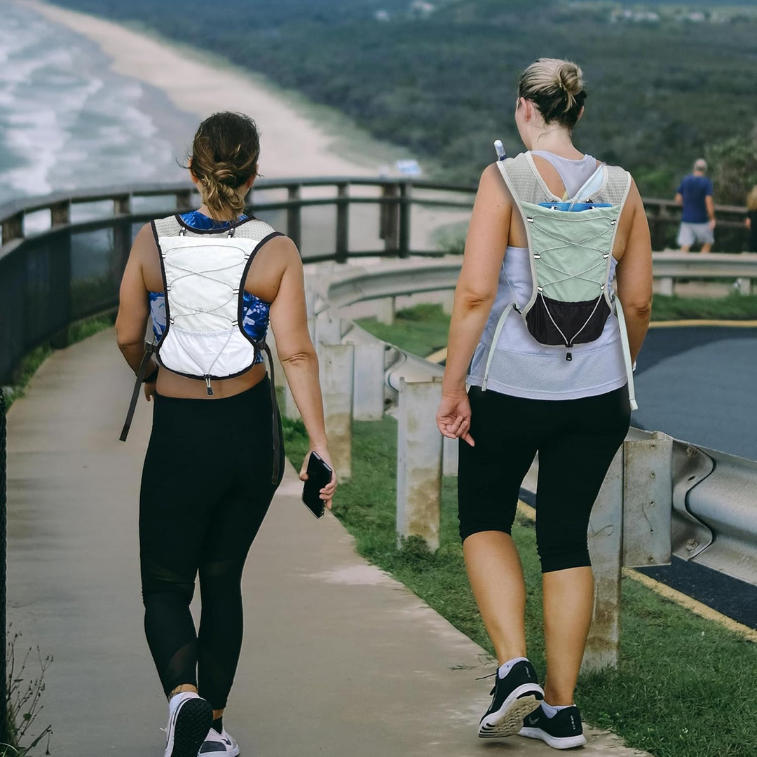 Close-up of the quality zippers and pulls on the Dravien running vest, durable sportswear