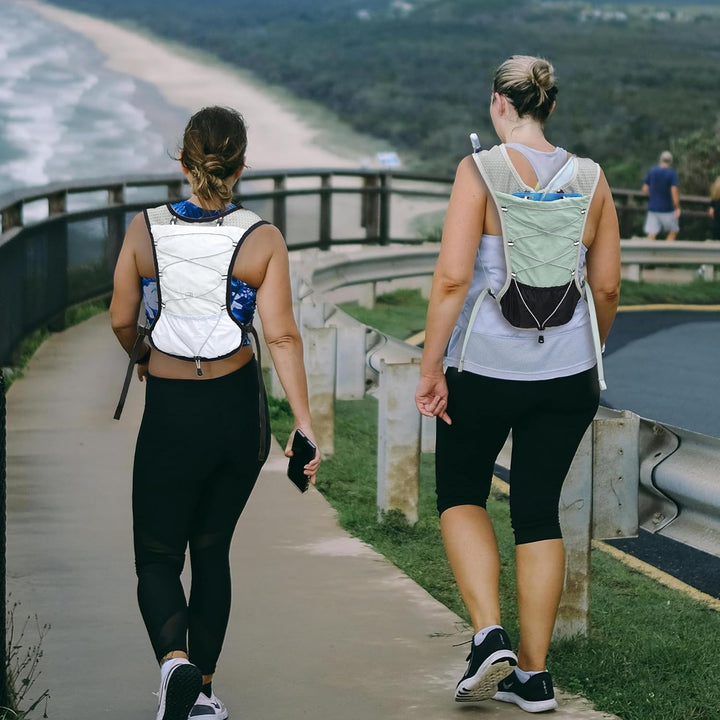 Close-up of the quality zippers and pulls on the Dravien running vest, durable sportswear