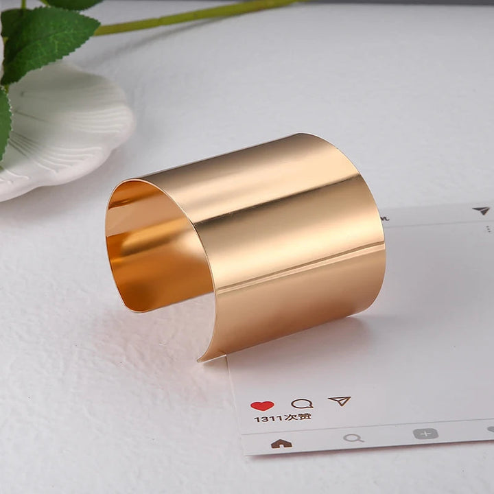 Rebel stainless steel bangle, an edgy punk fashion accessory for a bold and distinctive unisex look.
