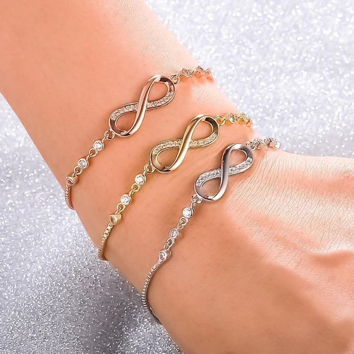 Elegant adjustable infinity bracelet in sterling silver, perfect for timeless jewelry lovers.