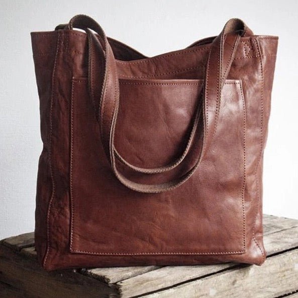 Women's light brown leather shoulder bag, perfect for everyday use. A stylish & durable fashion handbag.