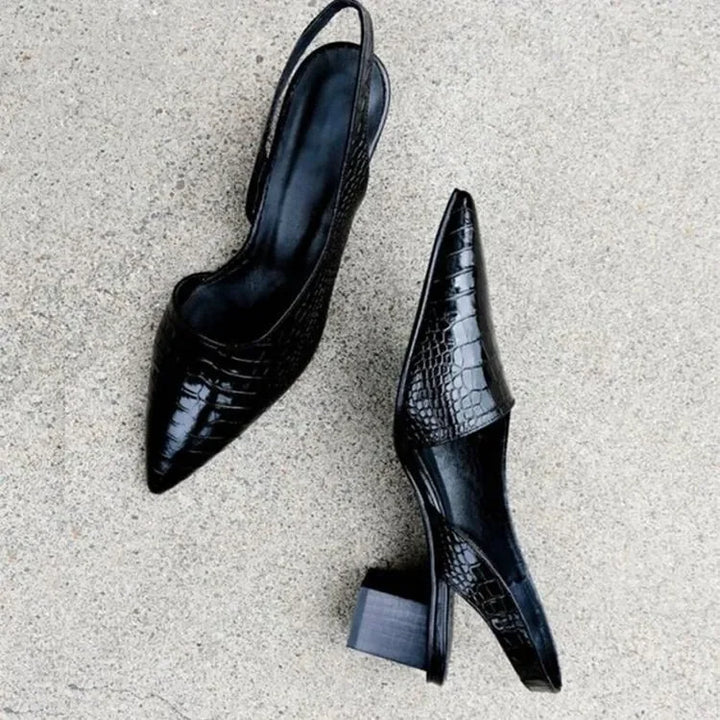 High-angle shot highlighting the chic design of women's elegant slingback block heel pumps