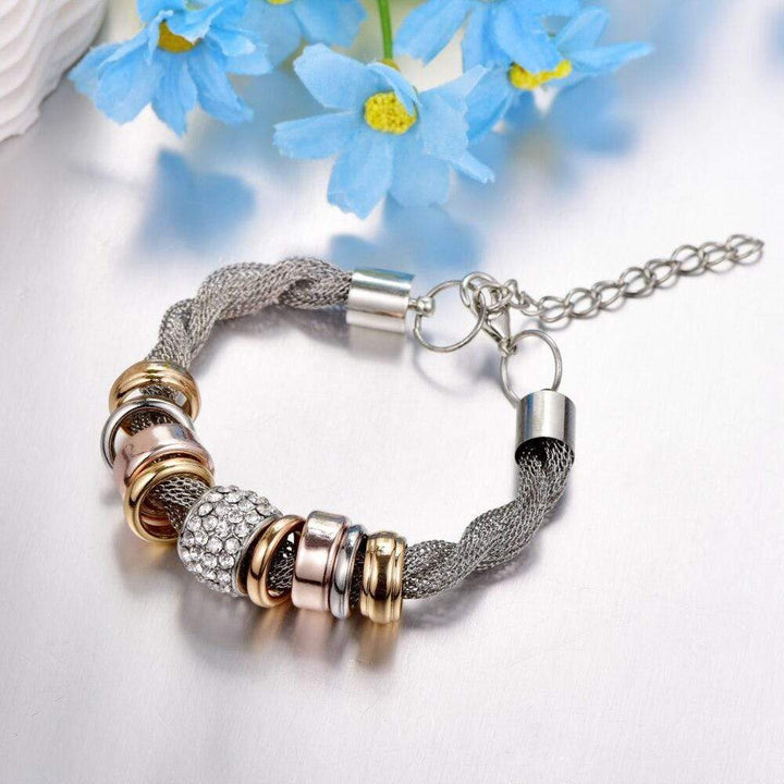 Stylish women's braided silver bracelet, a versatile fashion jewelry accessory from Zarina.