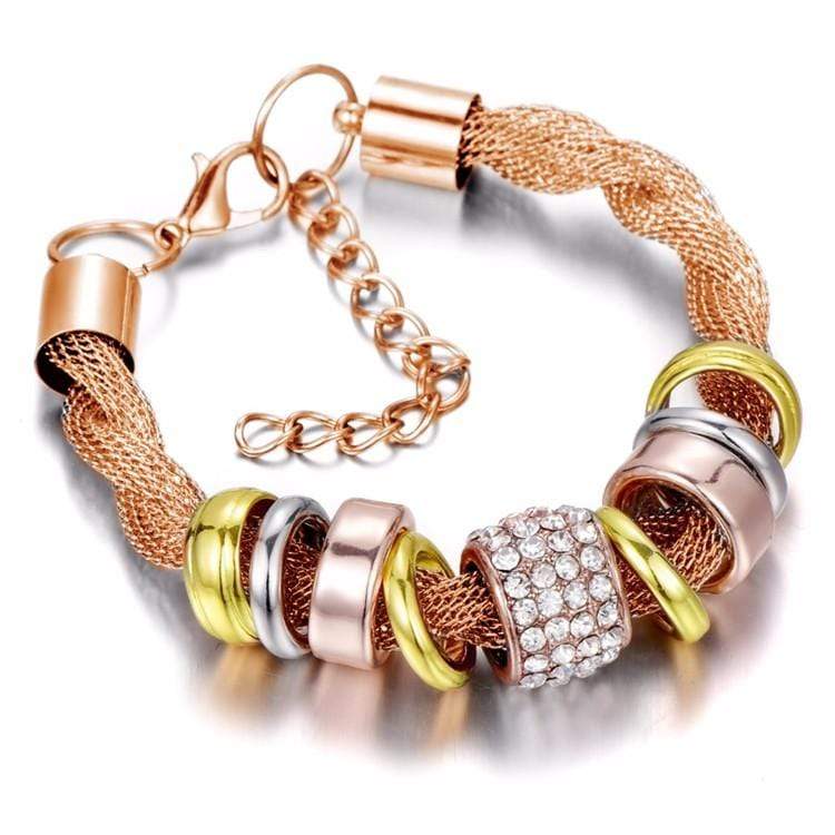 Detailed view of women's braided gold fashion bracelet, reflecting quality and stylish jewelry.