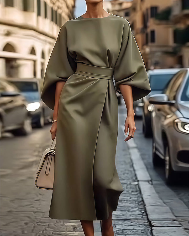 Versatile Celestine summer midi dress for women, featuring trendy puff sleeves. Perfect for an elegant look.