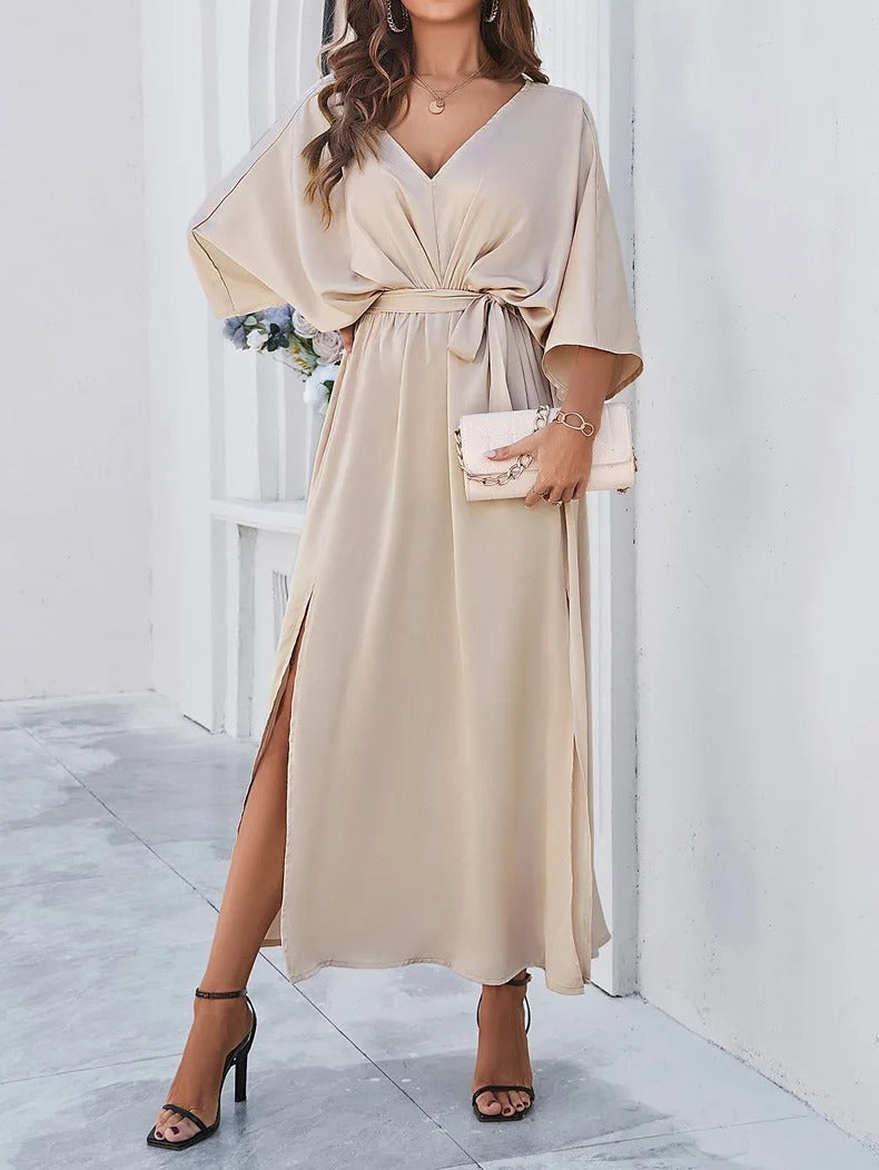Elegant champagne V-neck flowy midi dress for women, perfect for spring fashion & comfortable wear.
