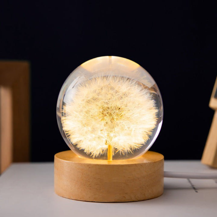 Beautiful crystal ball lamp featuring eternal flowers, a charming LED desk lamp for elegant home decor.